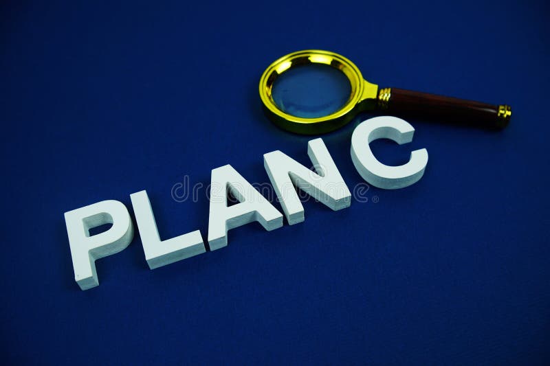 Plan C alphabet letters with magnifying glass top view on blue background Business and Communications concept. Alphabet project stock images, royalty-free photos and pictures
