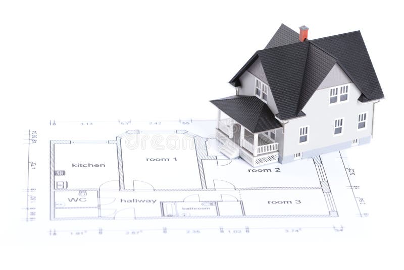 Plan de construction avec le modèle de maison photographie stock Plan de construction avec le modèle de maison photographie stock