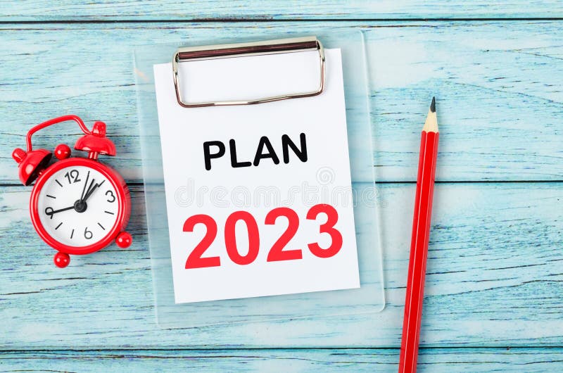 The 2023 Plan, Goal and Target Setting List for 2023 year with alarm clock. Change and determination concept