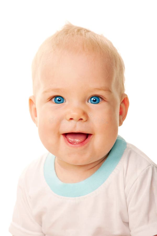 Plan rapproché aux yeux bleus de sourire de visage de chéri. images libres de droits Plan rapproché aux yeux bleus de sourire de visage de chéri. images libres de droits