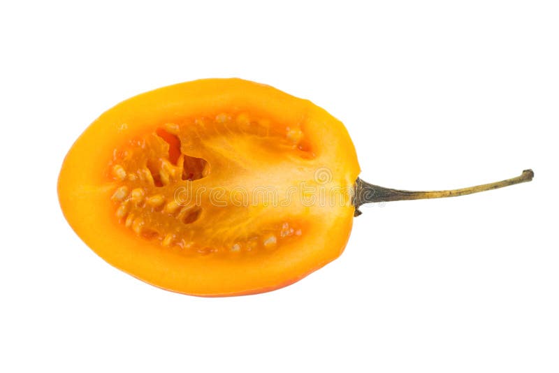 Plan rapproché d'un tamarillo coupé en tranches photo libre de droits Plan rapproché d'un tamarillo coupé en tranches photo libre de droits