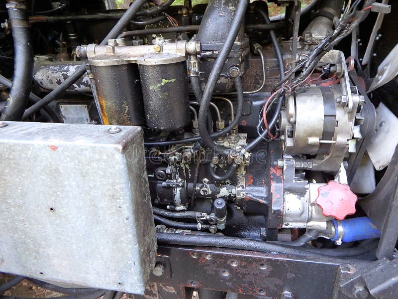 Plan rapproché d'un vieux moteur tracteur images libres de droits Plan rapproché d'un vieux moteur tracteur images libres de droits