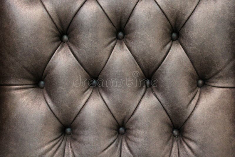 Plan rapproché de texture en cuir élégante avec des boutons Fragment d'une chaise classique image stock Plan rapproché de texture en cuir élégante avec des boutons Fragment d'une chaise classique image stock