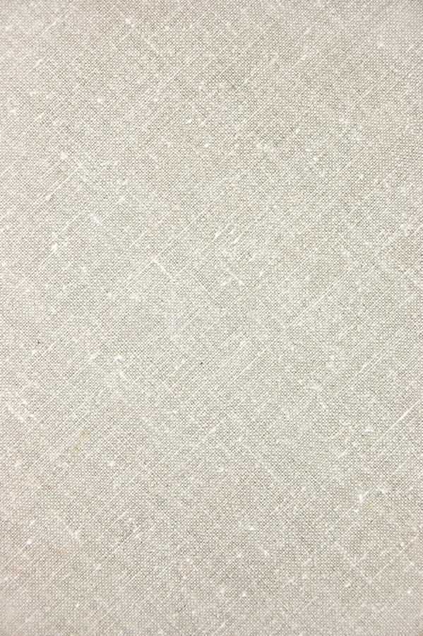 Plan rapproché diagonal de toile gris-clair de texture Plan rapproché diagonal de toile gris-clair de texture