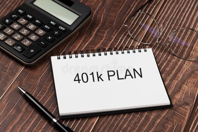 401 plan text on notepad with calculator, pen and eyeglasses - financial concept royalty free stock images