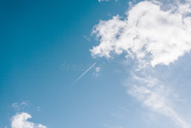 Plane Flighing High Above Clouds on Sunny Day Stock Image - Image of ...