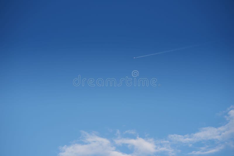 Plane Flying High in the Sky Stock Photo - Image of fuselage, aviation ...