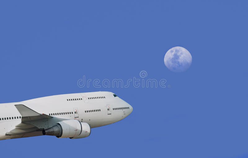 Plane & moon in depth of sky royalty free stock photo Plane & moon in depth of sky royalty free stock photo