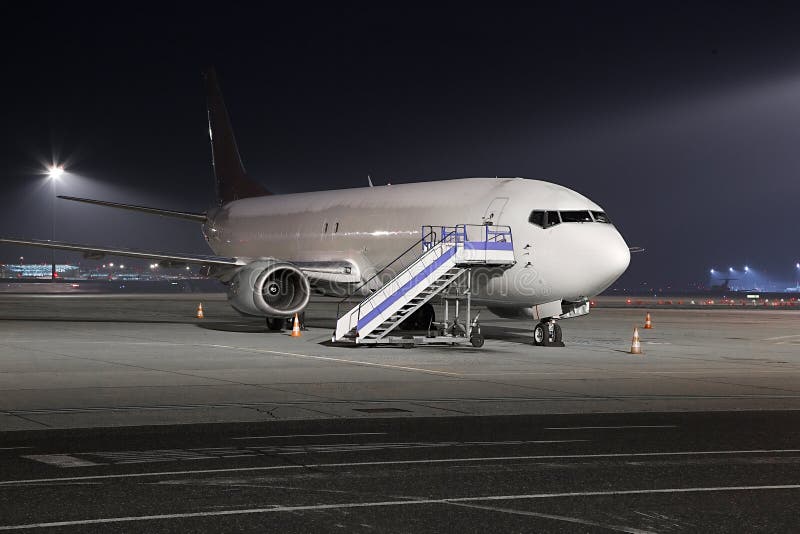 Plane at night stock photo. Image of industrial, aviation 71421430