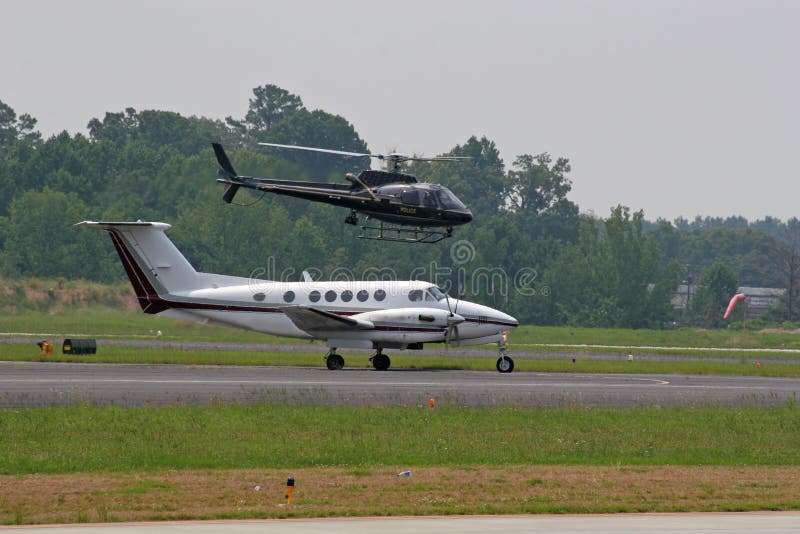 Plane and Police Chopper royalty free stock photos Plane and Police Chopper royalty free stock photos