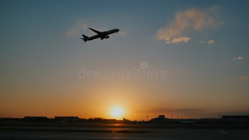 Plane taking off sky sunset sun dusk in airport China. Beijing.