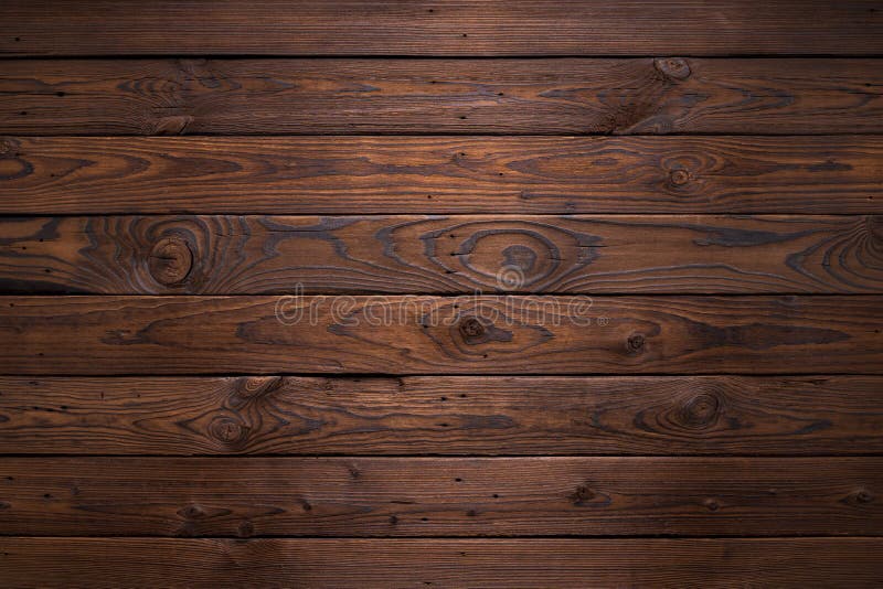 Planks of dark old wood texture background.