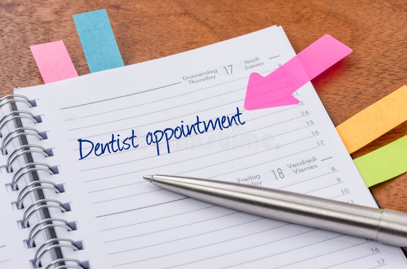 Daily planner with the entry Dentist appointment royalty free stock photography