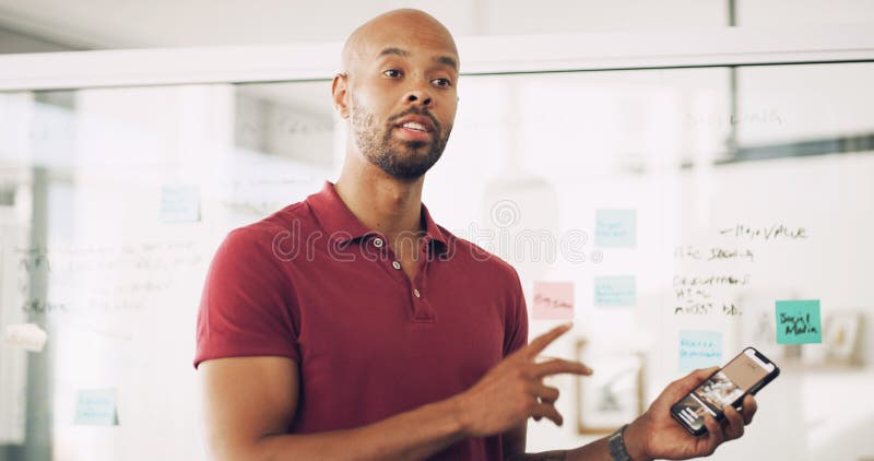 Planning, presentation and man with phone, app development and ideas for agenda, brainstorming and business. Glass wall stock photography
