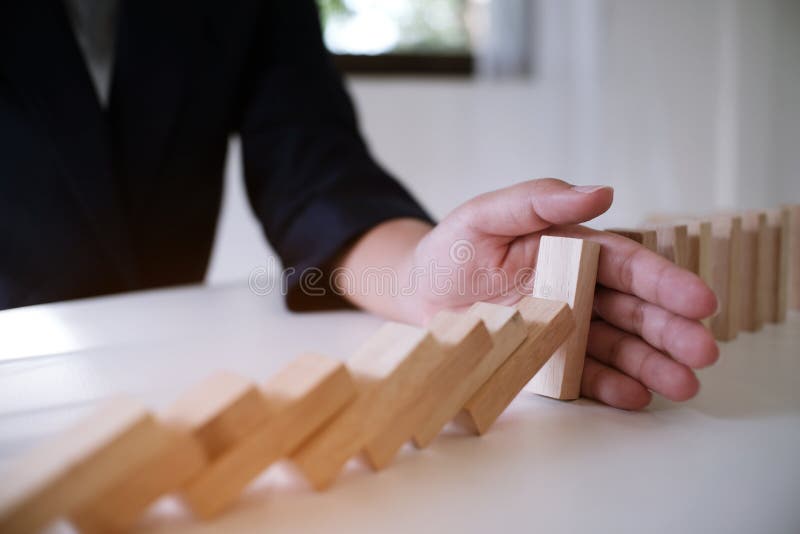 Planning risk and strategy in businessman gambling placing wooden block.Business concept for growth success process stock image Planning risk and strategy in businessman gambling placing wooden block.Business concept for growth success process stock image