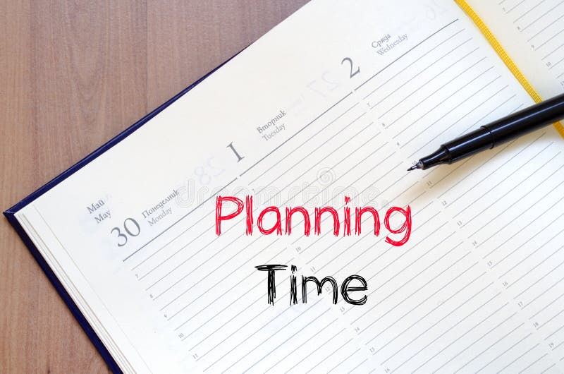 Planning time text concept on notebook royalty free stock photo