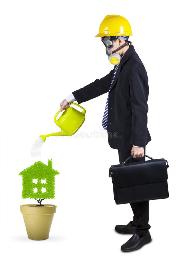 A planta molhando do homem de negócios isolou 1 fotos de stock royalty free A planta molhando do homem de negócios isolou 1 fotos de stock royalty free