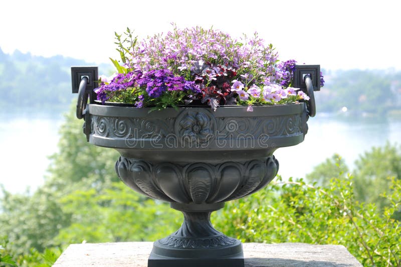 Garden planter with colorful flower arrangement. Garden planter with colorful flower arrangement