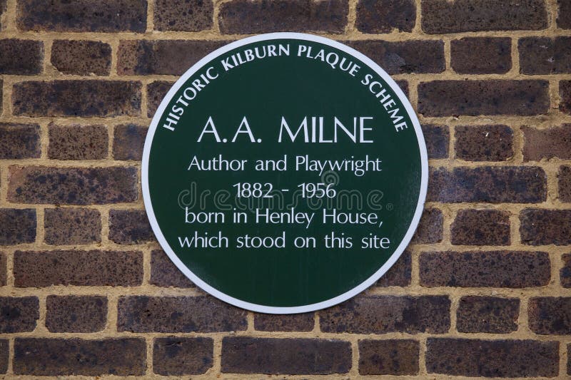 LONDON, UK - FEBRUARY 16TH 2017: A plaque marking the location where author and playwright A.A Milne was born in Kilburn, West London, taken on 16th February 2017. LONDON, UK - FEBRUARY 16TH 2017: A plaque marking the location where author and playwright A.A Milne was born in Kilburn, West London, taken on 16th February 2017.