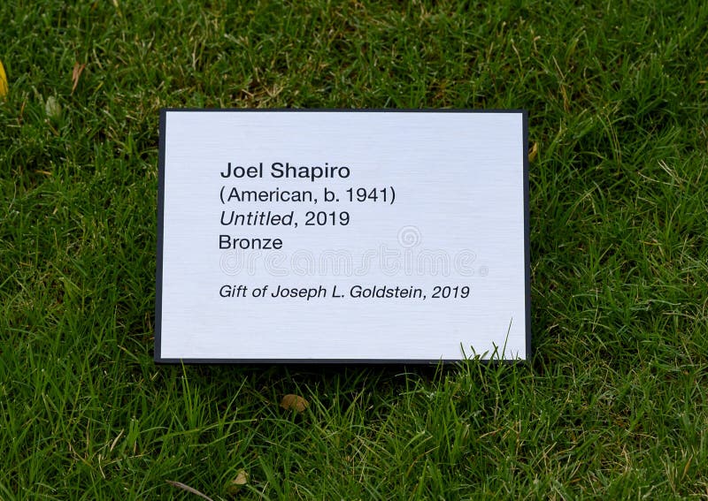 Pictured is the information plaque for `Unitltled`, a bronze sculpture by minimalist American sculptor Joel Shapiro, known for his dynamic work composed of simple rectangular shapes.  .  The sculture was a gift from Nobel Laureat Dr. Joseph L. Goldstein in 2019.  The piece was commissioned especially for the University of Texas Southwestern Medical School.  Talley Dunn Gallery helped Dr. Goldstein identify the sculptures to be donated and handled all the logistics of getting the piece from the artists studio to Dallas for installation. Of interest, all Joel Shapiro`s mature works are untitled. Pictured is the information plaque for `Unitltled`, a bronze sculpture by minimalist American sculptor Joel Shapiro, known for his dynamic work composed of simple rectangular shapes.  .  The sculture was a gift from Nobel Laureat Dr. Joseph L. Goldstein in 2019.  The piece was commissioned especially for the University of Texas Southwestern Medical School.  Talley Dunn Gallery helped Dr. Goldstein identify the sculptures to be donated and handled all the logistics of getting the piece from the artists studio to Dallas for installation. Of interest, all Joel Shapiro`s mature works are untitled.