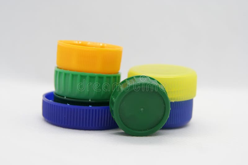 Plast- kapsyl f?rgrika kapsyler royaltyfri bild Plast- kapsyl f?rgrika kapsyler royaltyfri bild