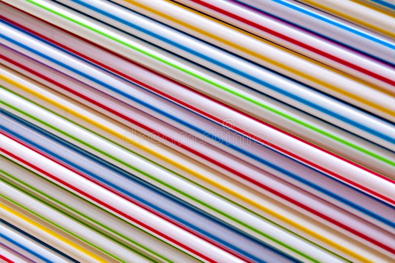 Plast- som dricker sugrör, bakgrund arkivbild
