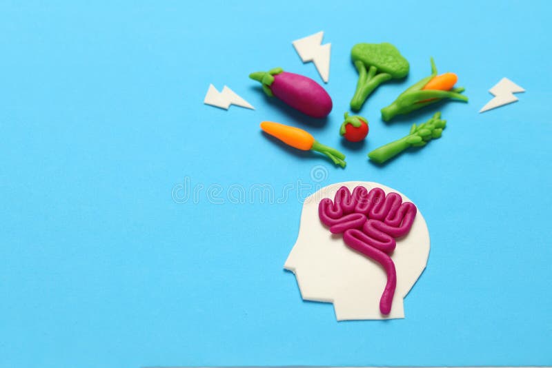 Plastellinadiagram av mannen och vegetarisk mat Mat f?r meningen, laddning av energi Sund livsstil, detoxification och antioxidan arkivbilder Plastellinadiagram av mannen och vegetarisk mat Mat f?r meningen, laddning av energi Sund livsstil, detoxification och antioxidan arkivbilder