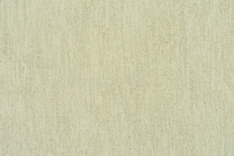 Plaster of the house with the texture of eaten bark bark stock image