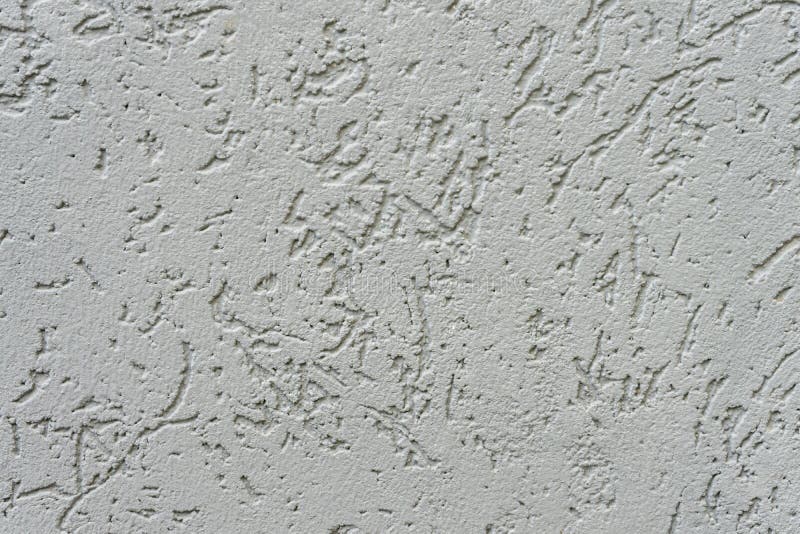 Plaster of the house with the texture of eaten bark bark stock images
