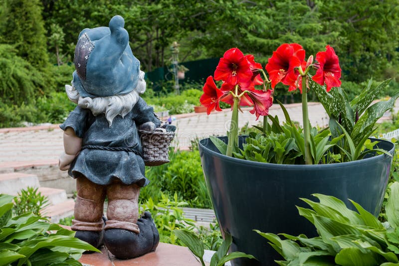 Plaster Sculptures of Assistants in a Garden Stock Photo Image of
