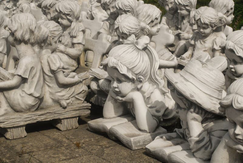 Plaster statues of angels stock image. Image of sculpture - 240387717