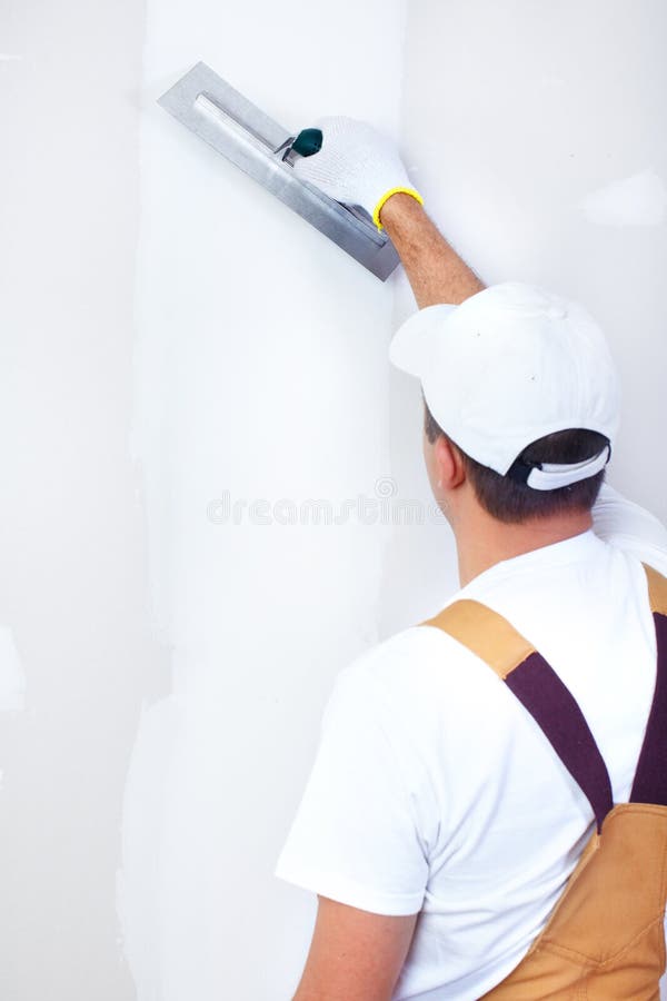 Plasterer dell'appaltatore fotografia stock libera da diritti Plasterer dell'appaltatore fotografia stock libera da diritti
