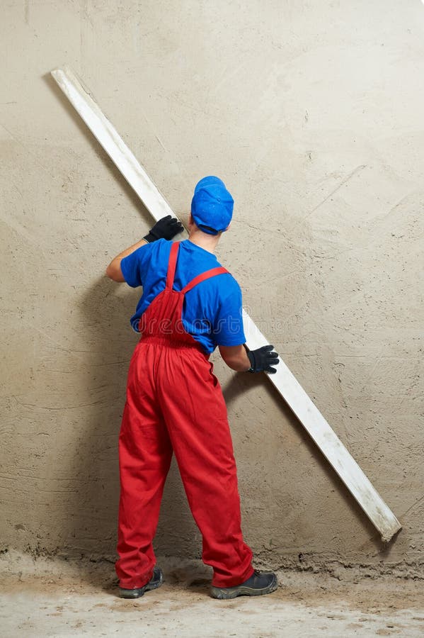 Plasterer sul lavoro immagini stock libere da diritti Plasterer sul lavoro immagini stock libere da diritti