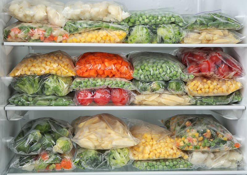 Plastic Bags with Frozen Vegetables in Refrigerator Stock Photo Image of pack, freezer 165428556