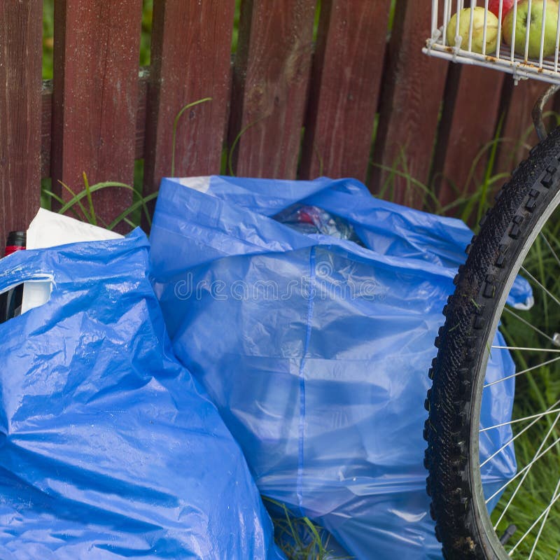 Plastic bags with garbage stock photo. Image of discarded 236385478