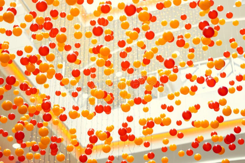 Plastic balls suspended stock image. Image of bright 110531733