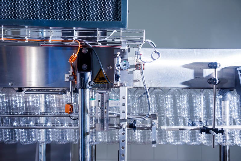 The Plastic Bottle Blowing Machine. PET Preforms for Blowing of Plastic