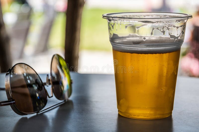 Sunglasses and beer stock image. Image of holiday, drops 126378497