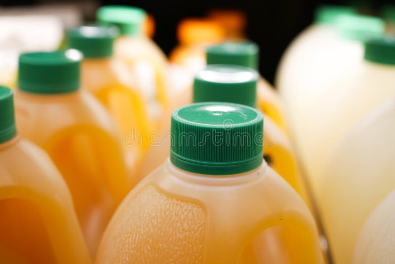 Plastic Bottle of Orange Juice in a Shelf Stock Photo Image of drink