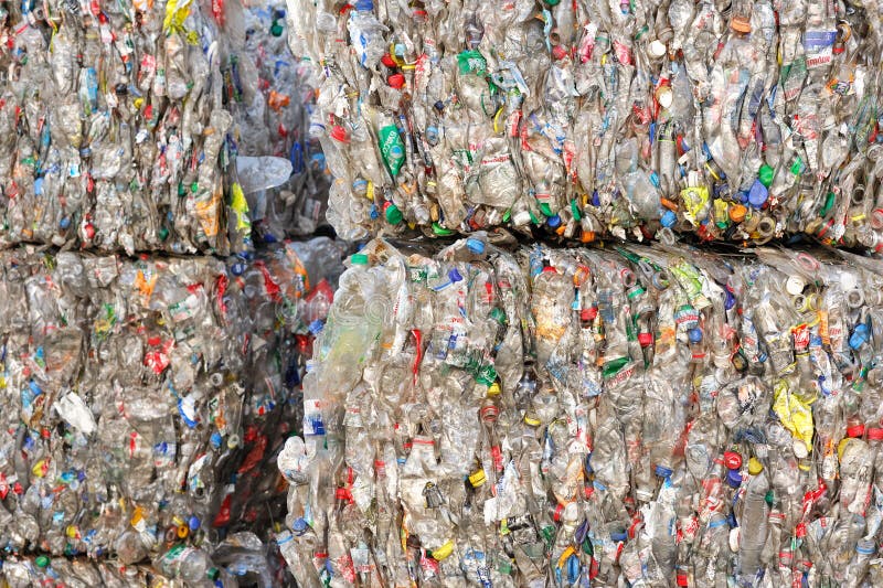 Plastic Bottles in Extruded Form at a Plant for Processing Raw