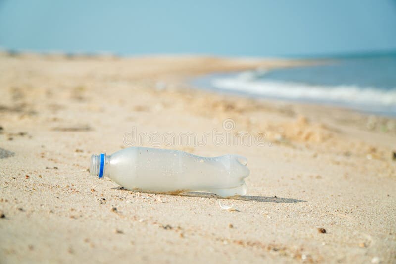 Plastic Bottles Were Left for a Long Time on the White Beach.plastic