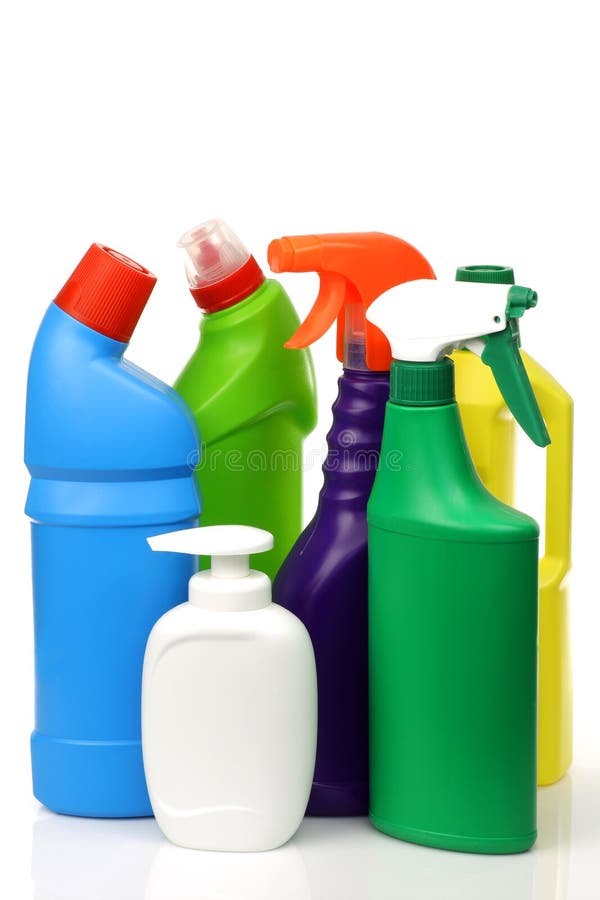 Plastic cleaning bottles in various colors stock images