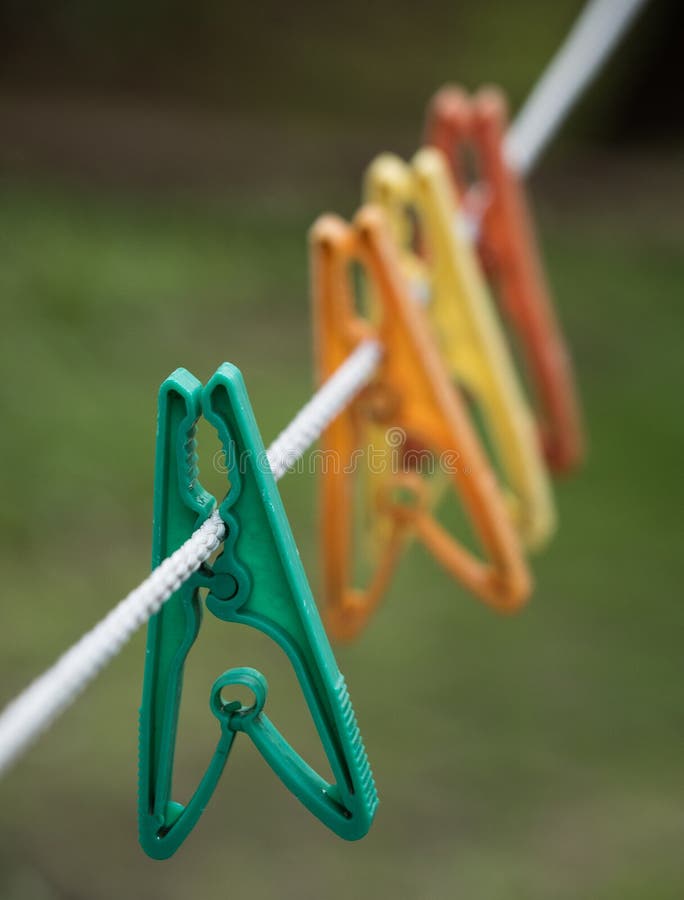 Plastic Clothes Pegs on a Line Stock Image Image of waste, pegs 97857741