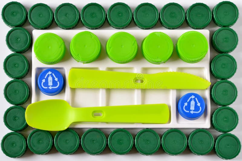 Plastic Corks for Recycling and Cutlery Made from Them Stock Image