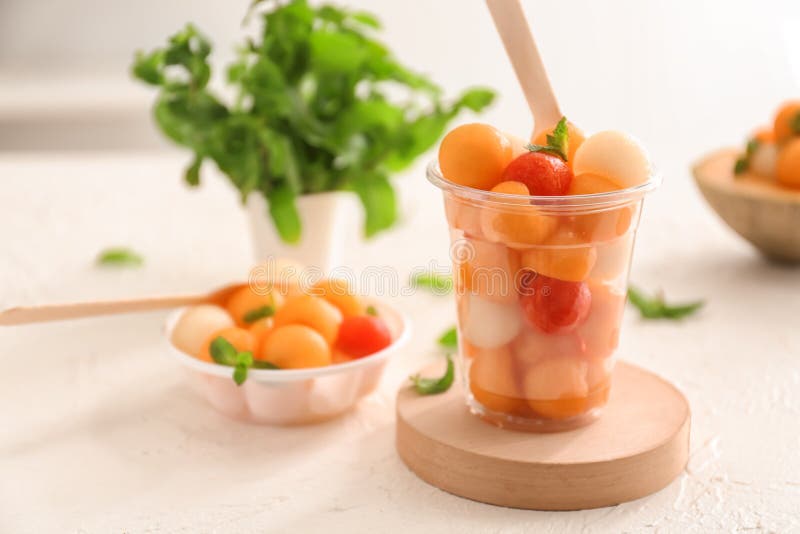 Plastic Cup with Tasty Melon Balls on Table Stock Photo Image of