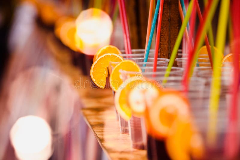 Plastic cups with refreshing drinks with alcohol in the bar of a summer  festival in Spain Stock Photo - Alamy