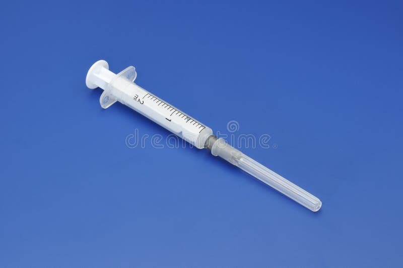 Plastic Disposable Syringe with a Needle in the Protective Cap Stock