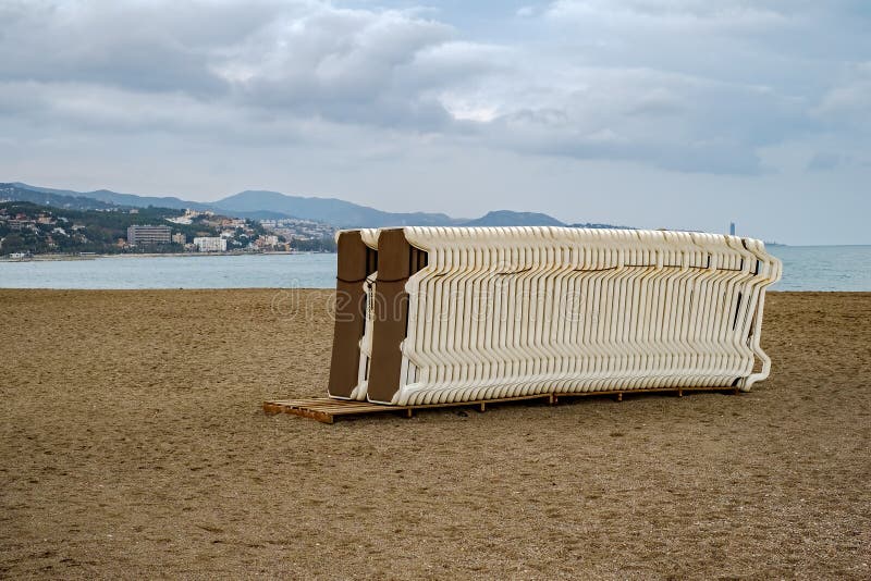 Plastic Lounge Chairs Stacked Stock Image - Image of chairs, sunbathe