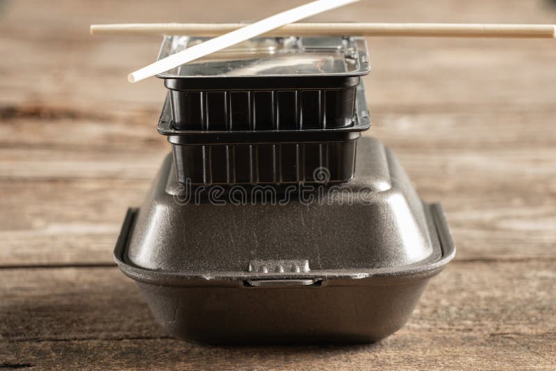 Plastic Packaging for Sushi Delivery from a Restaurant on a Table Close