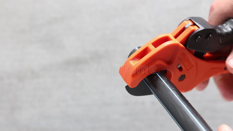 Cutting HDPE pipe with cutter scissors for cut plastic pipes. stock video